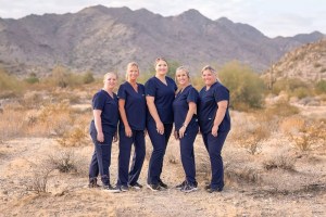 group photo outside wide view in the desert